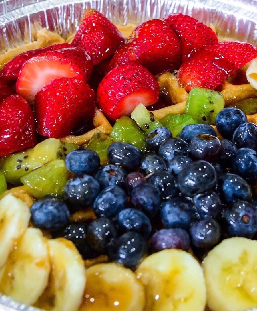 Waffle topped with fresh fruit